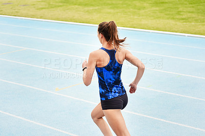 Buy stock photo Motivation, race track and woman for running, exercise and workout for sport outdoor by grass or field. Stadium, runner and athlete for wellness and gym for cardio, training and health in back view