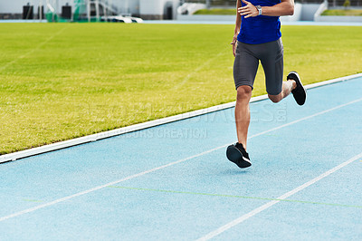 Buy stock photo Man, legs and running on stadium track for fitness, workout or exercise of athlete training outside. Leg of male person or runner exercising in run, athletics or sports competition for healthy cardio