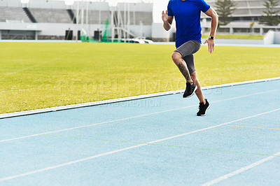 Buy stock photo Man, legs and running on track for fitness, workout or exercise of athlete training at the stadium. Leg of male person or runner exercising in run, athletics or sports competition for healthy cardio