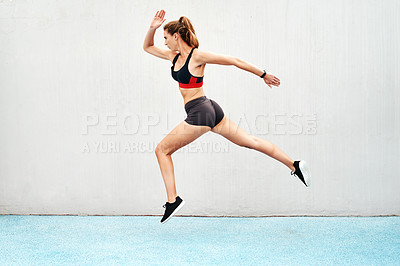 Buy stock photo Woman, fitness and running on mockup in training, exercise or cardio workout outdoors. Fit, active or sport female person or runner in sports motivation, run or healthy wellness on wall mock up space