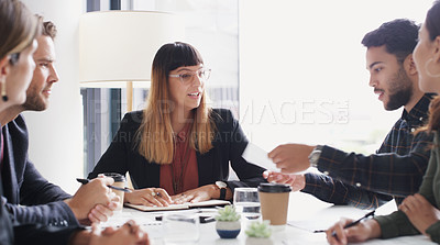 Buy stock photo Shot of a group of businesspeople having a meeting in a boardroom