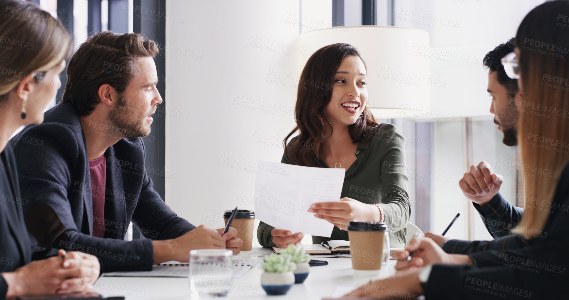 Buy stock photo Shot of a group of businesspeople having a meeting in a boardroom