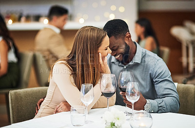 Buy stock photo Funny, date and interracial couple with red wine for fine dining, luxury restaurant or valentines celebration together. Black man, happy woman and alcohol glasses for romance, wealth or anniversary