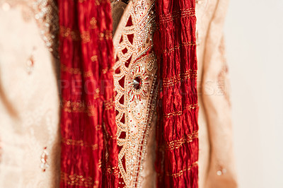 Buy stock photo Shot of men’s clothing in a bedroom before a traditional Indian wedding ceremony