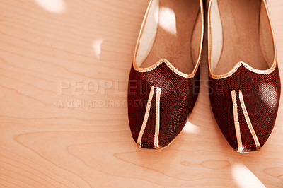 Buy stock photo Shot of two formal men’s shoes on the floor of a bedroom