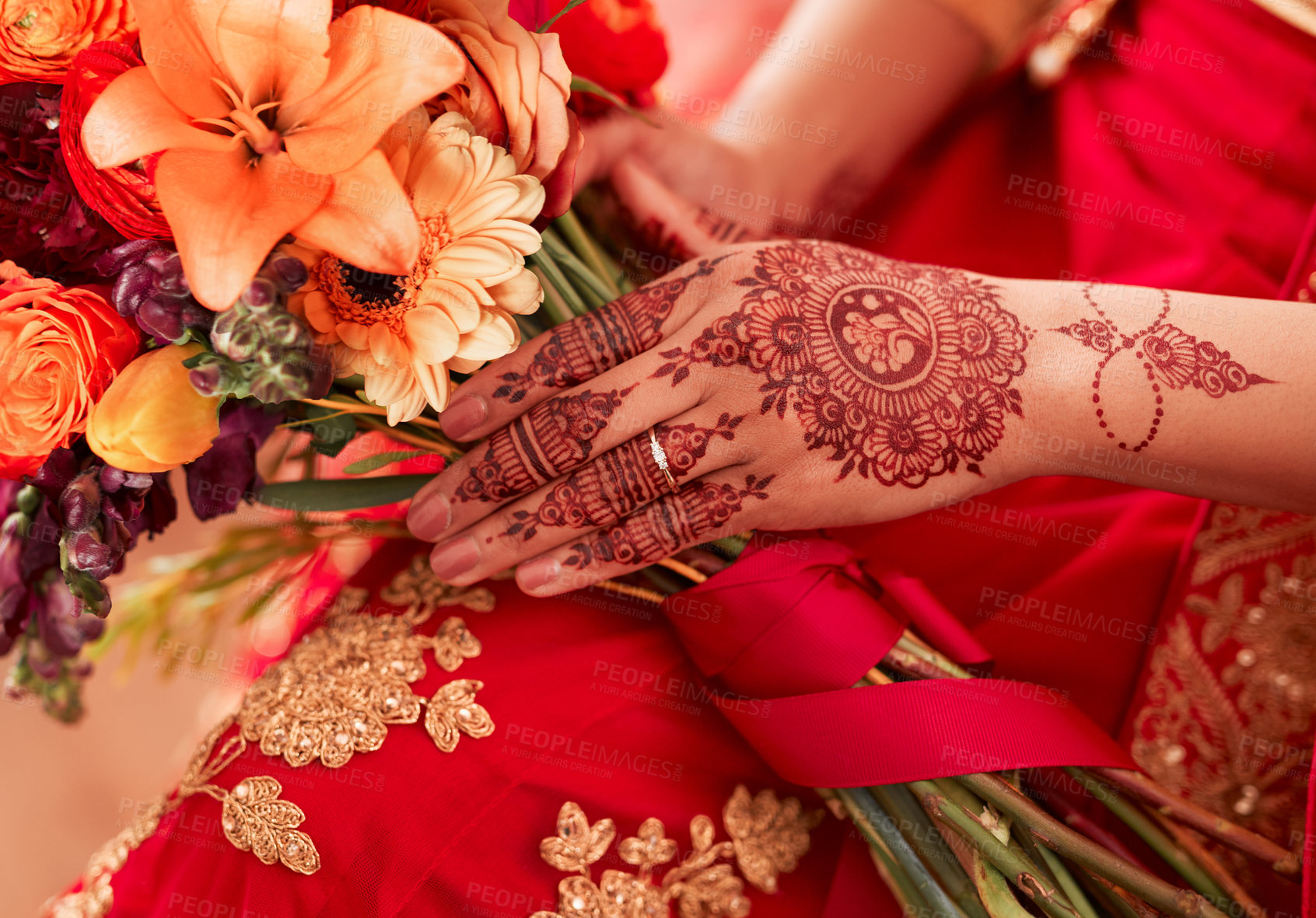Buy stock photo Henna, hands and Indian woman at her wedding event with flowers or bouquet for decoration or design. Luxury, marriage and traditional culture by a bride with art pattern on her hand for celebration