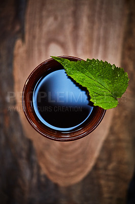 Buy stock photo Shot of a glass of freshly made herbal tea