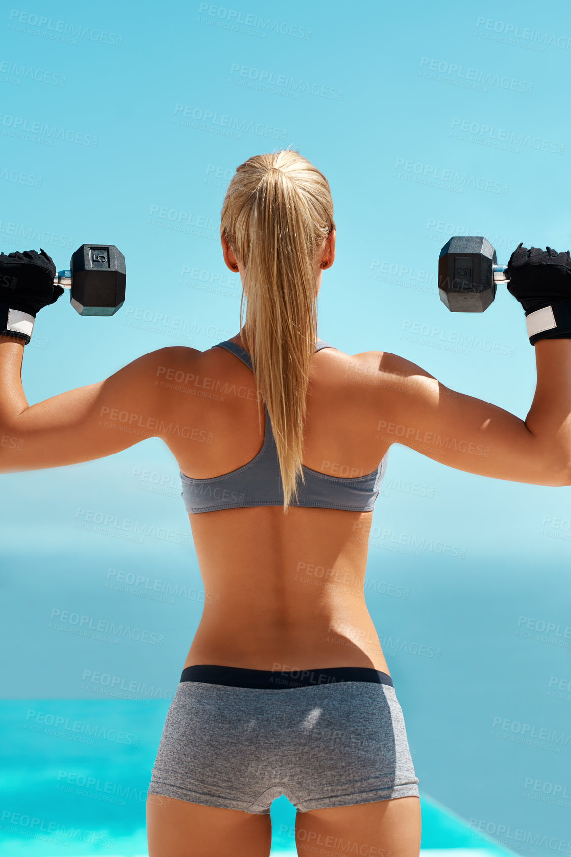 Buy stock photo Fitness, back and person with dumbbells, health and benefits of muscle strength or coordination. Blue sky, training and versatility of free weights for shoulder presses, active or outdoor for workout