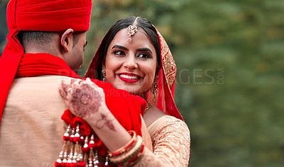 Buy stock photo Cropped shot of a young hindu couple on their wedding day