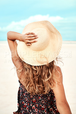 Buy stock photo Back, beach and woman with vacation, holiday and relaxing with getaway trip and sunshine. Ibiza, rear view and girl with hat and seaside with summer and ocean with freedom and travelling with 