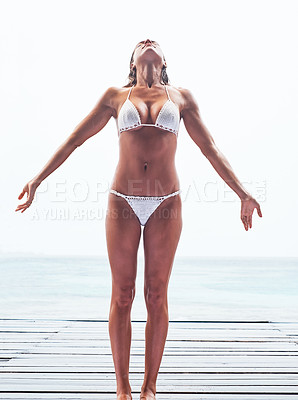 Buy stock photo Body, swimsuit and freedom for woman, sea and summer for holiday to travel, deck and relax in weekend. Beach, wood and person in bikini, outdoor and tourist in Maldives, tropical and vacation for sun