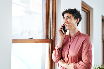 Buy stock photo Woman, office and happy with phone call in studio for communication, networking and discussion. Female person, employee and smile or satisfied for business conversation, connection and laughing