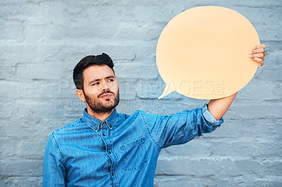 Buy stock photo Thinking, speech bubble and man by wall with space for opinion, voting decision and social media communication icon. Outdoor, male person and mockup sign with ideas for election vote and announcement