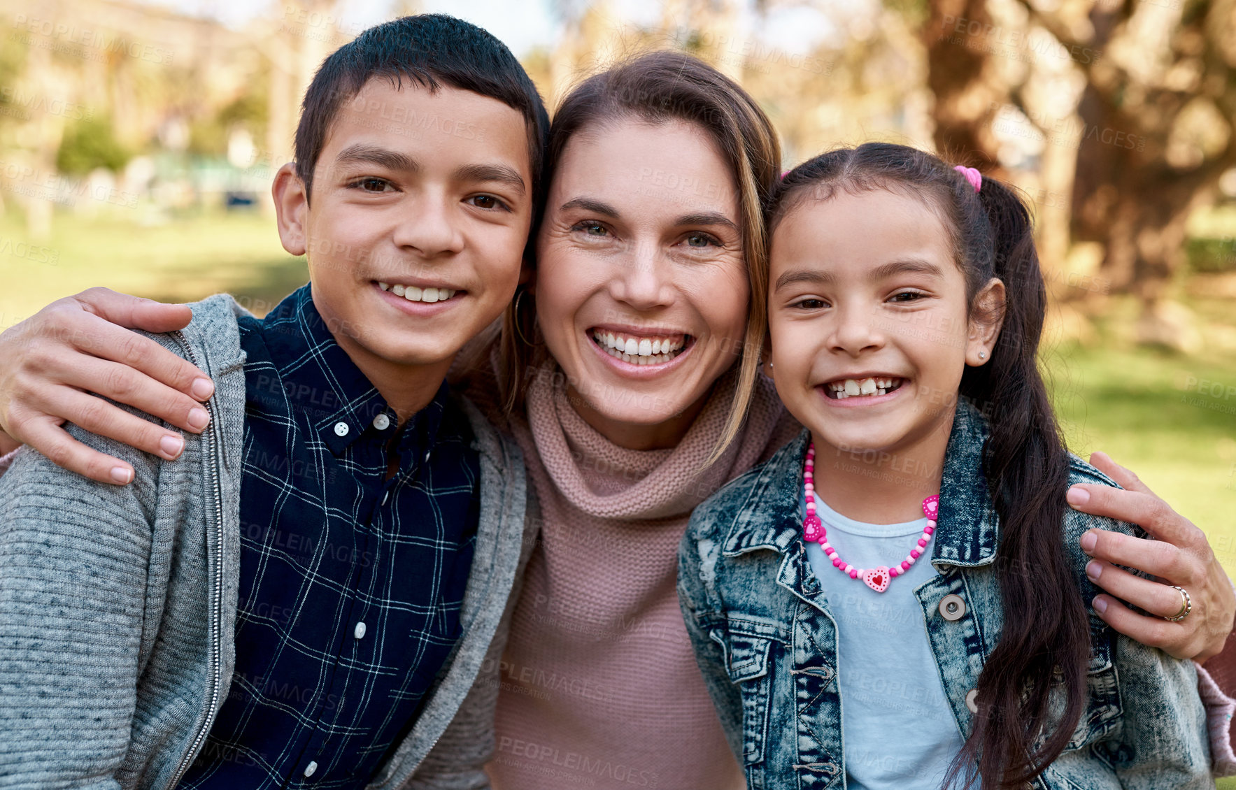 Buy stock photo Park, mother and kids in portrait as family, bonding and spend time together with smile. Happy people, mom or parent with children outdoor in nature for relaxing, recreation or physical activity