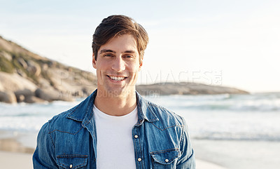 Buy stock photo Man, portrait and beach with sunshine and smile in the outdoors for an adventure and happiness. Ocean, sun and male person is happy in the outdoor for day to relax in the summer with nature and air.
