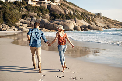 Buy stock photo Walking, couple and holding hands on journey at beach in summer, holiday or vacation in Bali. Honeymoon, travel and woman trust man with love and commitment in marriage or date with sunset adventure