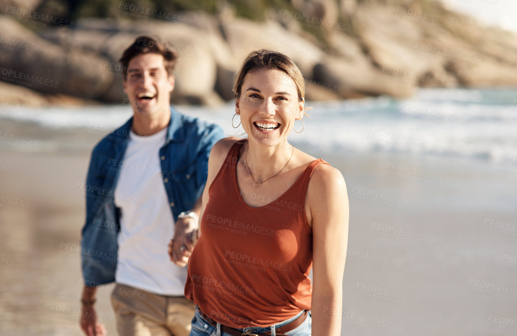 Buy stock photo Couple, portrait and holding hands with woman at beach on journey in summer, holiday or vacation. Happy, travel and lead man with smile on face on island at sunset offshore and adventure in marriage 