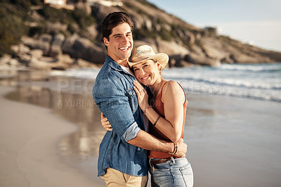 Buy stock photo Couple hug, portrait and sunshine by ocean for smile, holiday romance, love together and honeymoon. Happy woman, face and man at beach for summer vacation, peace and marriage with trust in Argentina