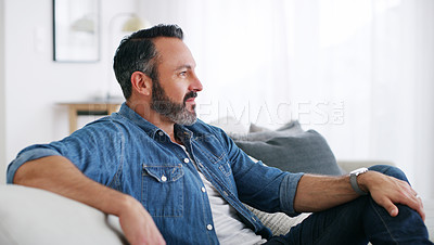 Buy stock photo Cropped shot of a middle aged man relaxing at home