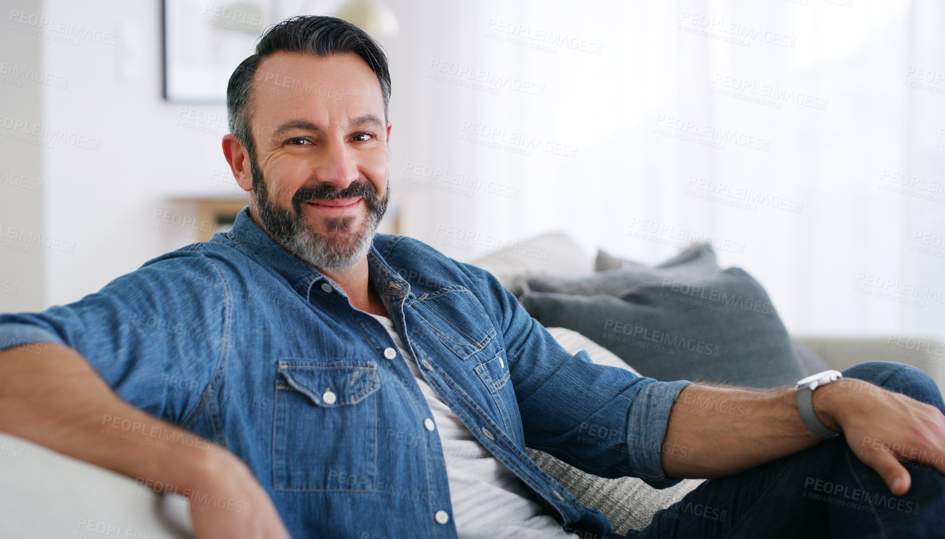 Buy stock photo Cropped shot of a middle aged man relaxing at home