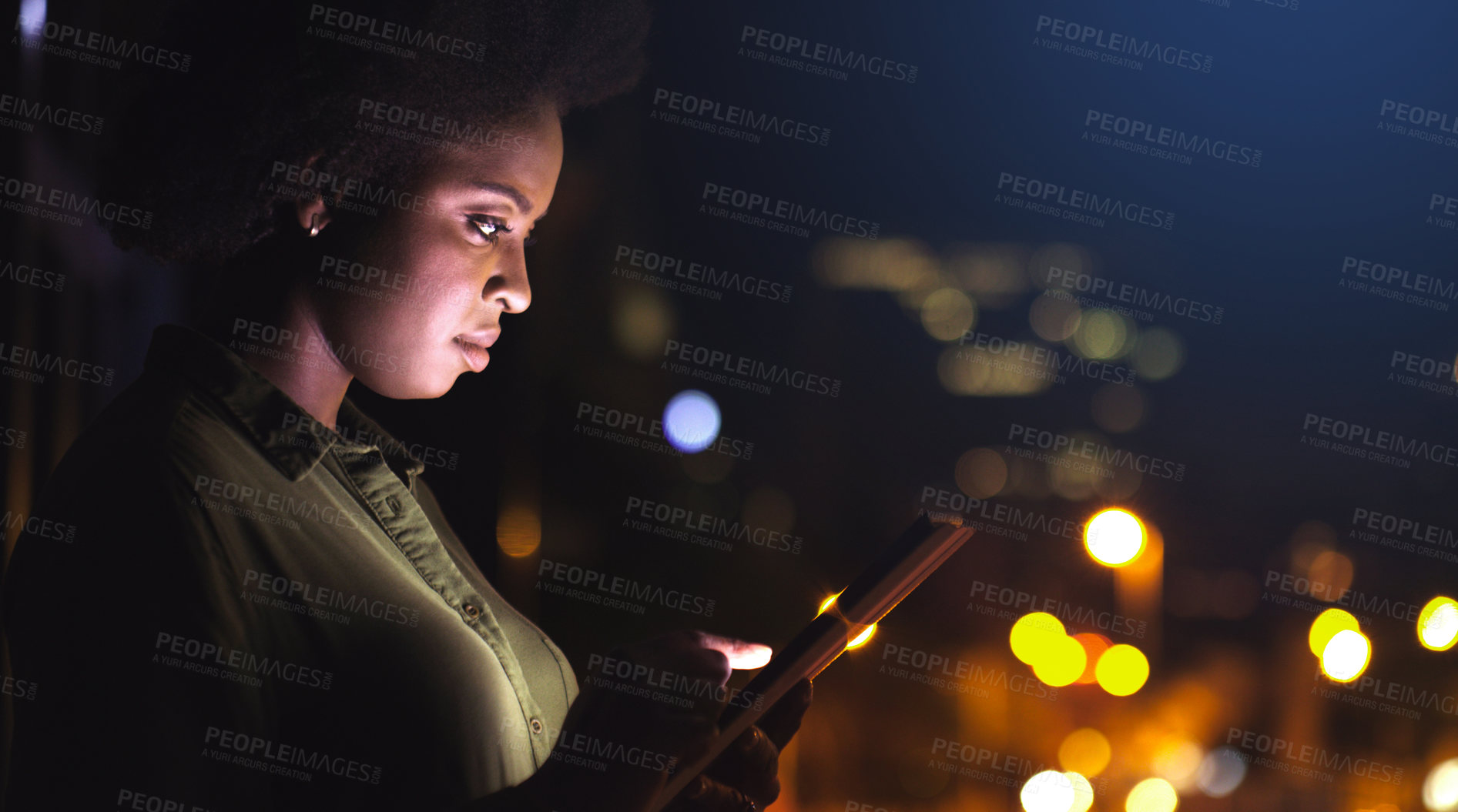 Buy stock photo Shot of a woman using a digital tablet while standing on the balcony of her office