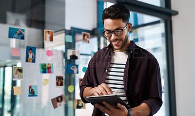 Buy stock photo Businessman, browsing internet or tablet in office with sticky notes for online research and brainstorming. Male person, technology and headshot on transparent wall for model agency or social media 