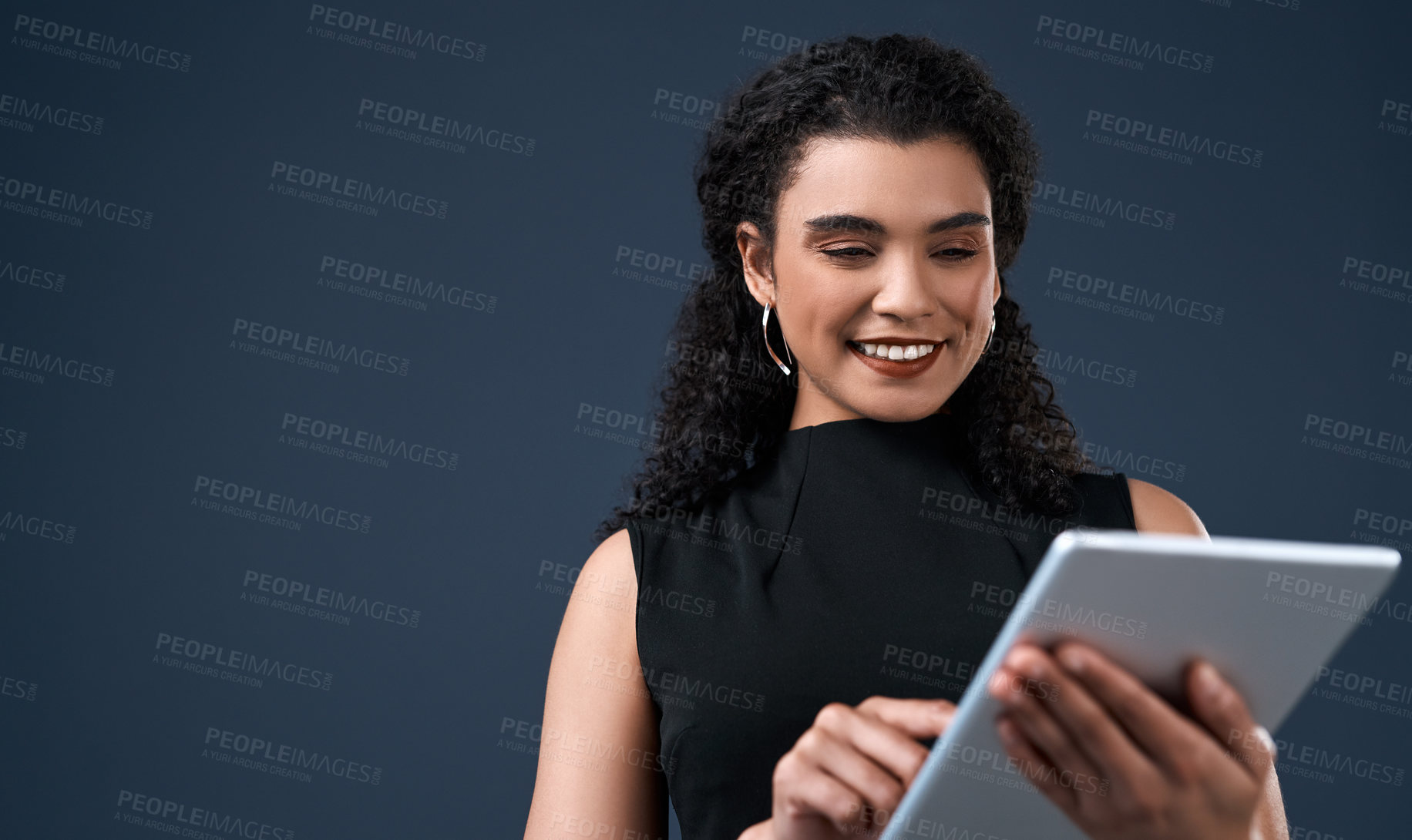 Buy stock photo Business woman, tablet and portrait in studio with smile, happiness and app for company work. Corporate employee, technology and typing on blue background with research, email and internet for job
