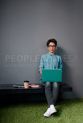 Buy stock photo Woman, laptop and thinking on bench for online education, planning or e learning opportunity on wall background. Young student listening to podcast with PhD idea, inspiration or vision on computer