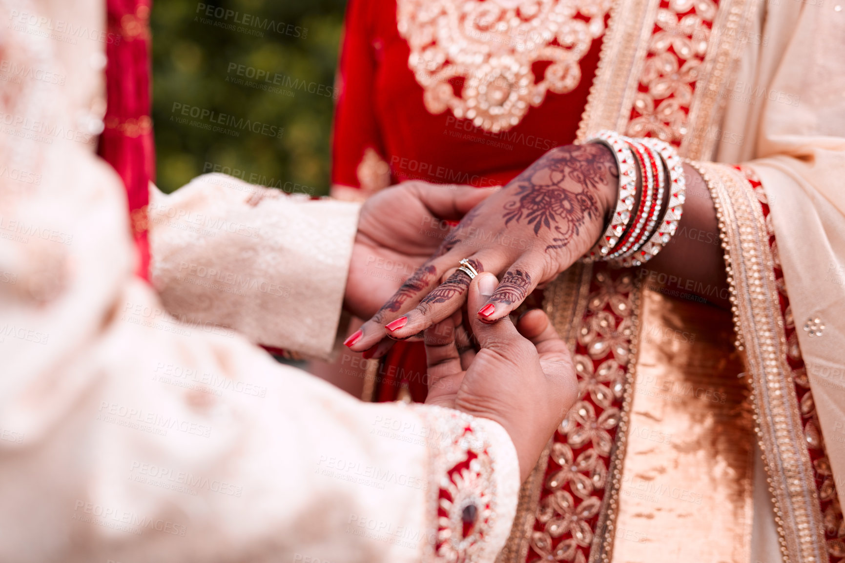 Buy stock photo Indian, bride and hands with ring, wedding and morning with henna, luxury and culture for woman. Celebration, jewellery and person with groom in clothes, ceremony and traditional for event in Dubai