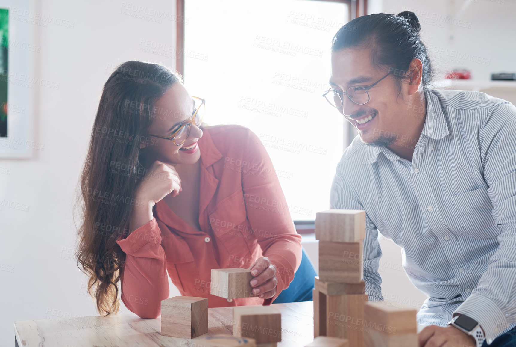Buy stock photo Team building, businessman and woman with wood blocks in office for vision challenge game and design innovation ideas. Engineering, architecture and creative startup with problem solving block games
