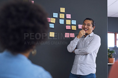 Buy stock photo Meeting, brainstorming and planning with team, man speaker, sticky note and leadership in presentation. Collaboration, people in strategy workshop at startup, ideas with presenter and audience