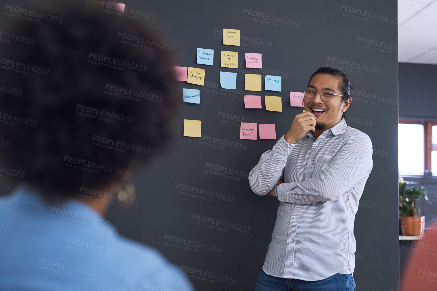 Buy stock photo Meeting, brainstorming and planning with team, man speaker, sticky note and leadership in presentation. Collaboration, people in strategy workshop at startup, ideas with presenter and audience