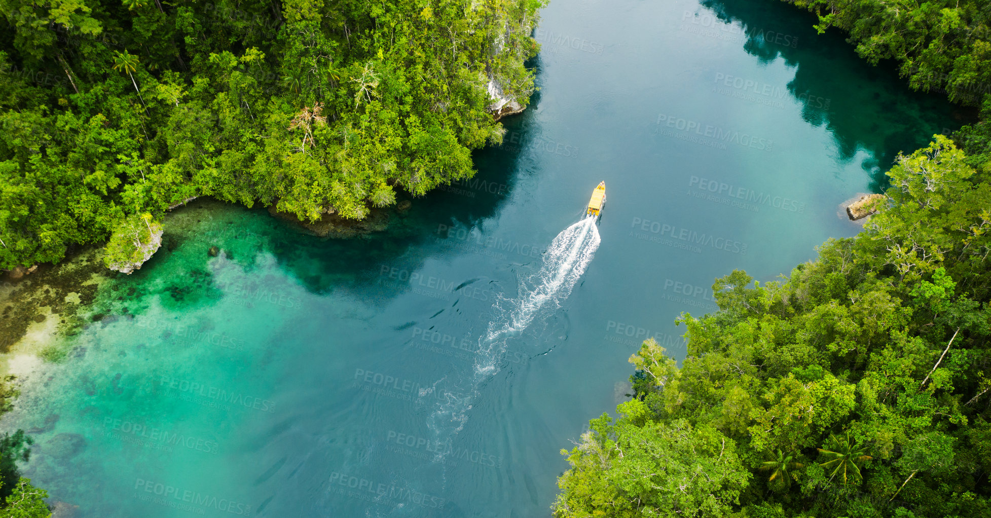 Buy stock photo Island, tropical and drone of a boat in nature with trees for sailing on vacation or weekend trip. Travel, adventure and aerial view of speedboat on a river of resort water for summer holiday.