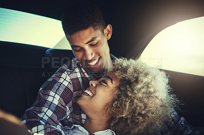 Buy stock photo Cropped shot of a happy young couple out on a road trip