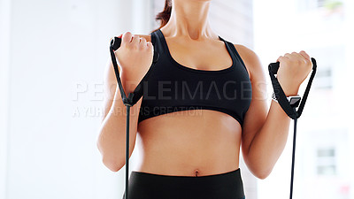 Buy stock photo Shot of an unrecognizable woman working out at the gym