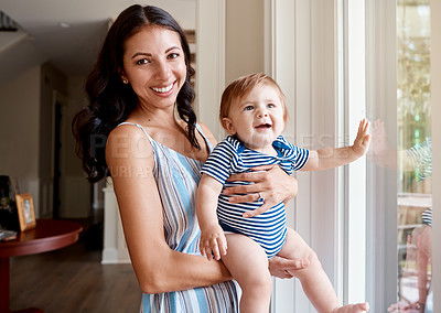 Buy stock photo Portrait of a mother bonding with her baby boy at home