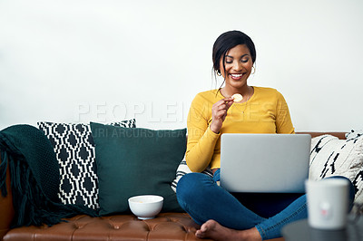 Buy stock photo Sofa, laptop and woman eating chips for movie, video streaming service or subscription at home. Happy african person watch film with potato chip, computer and internet connection on living room couch