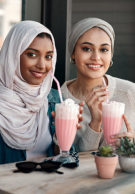 Buy stock photo Muslim women, portrait and friends in cafe for milkshake, bonding or reunion for drinks with care. Islamic people, together and happy to relax, pride or connection with dessert smoothie at restaurant