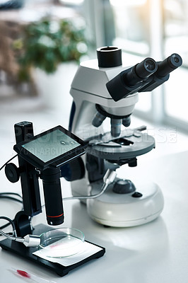 Buy stock photo Still life shot of two microscopes  placed in a laboratory