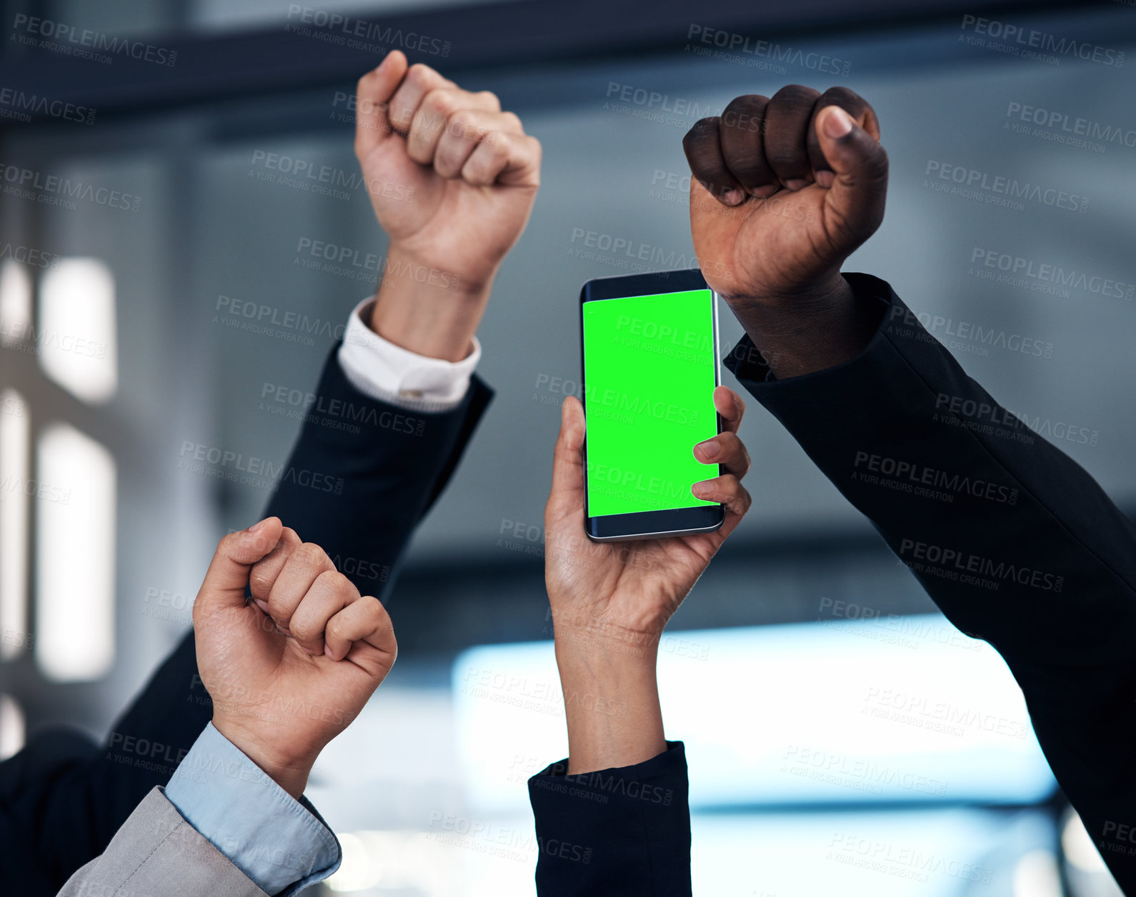 Buy stock photo Cropped shot of a group of businesspeople cheering and holding a smartphone in a modern office