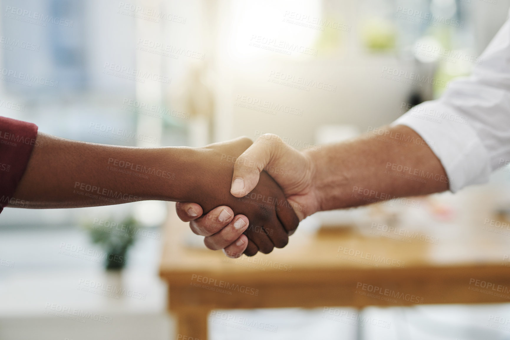 Buy stock photo A team handshake in agreement between colleagues and coworkers in an office. Working together as a team to achieve success, merge as a partnership or promote a business person at work closeup.