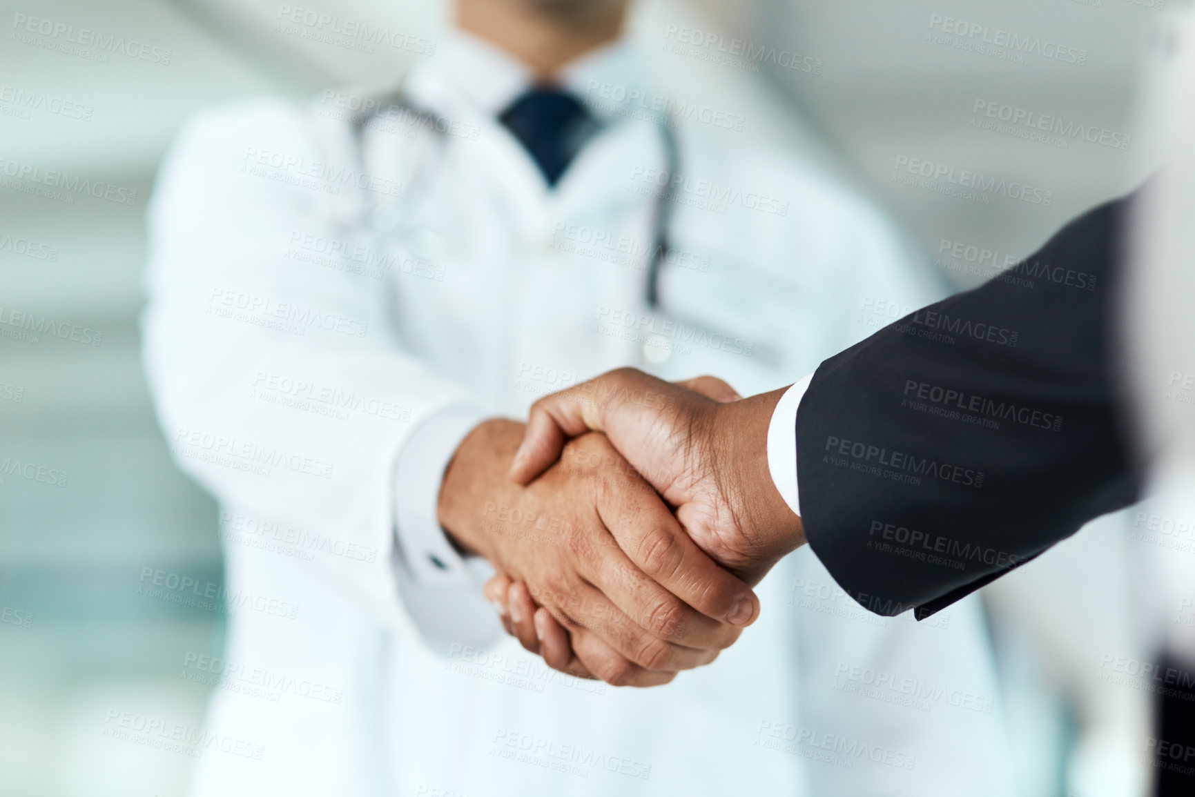 Buy stock photo Closeup, doctor or man with handshake, negotiation or planning with partnership, healthcare or wellness. Medical professional, consultant or employee with an offer, support or teamwork with promotion
