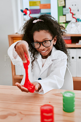 Buy stock photo Science, experiment and African child with slime learning, studying or happy experience in school. Scientist, girl in glasses and education in classroom, research and smile for experimenting or play