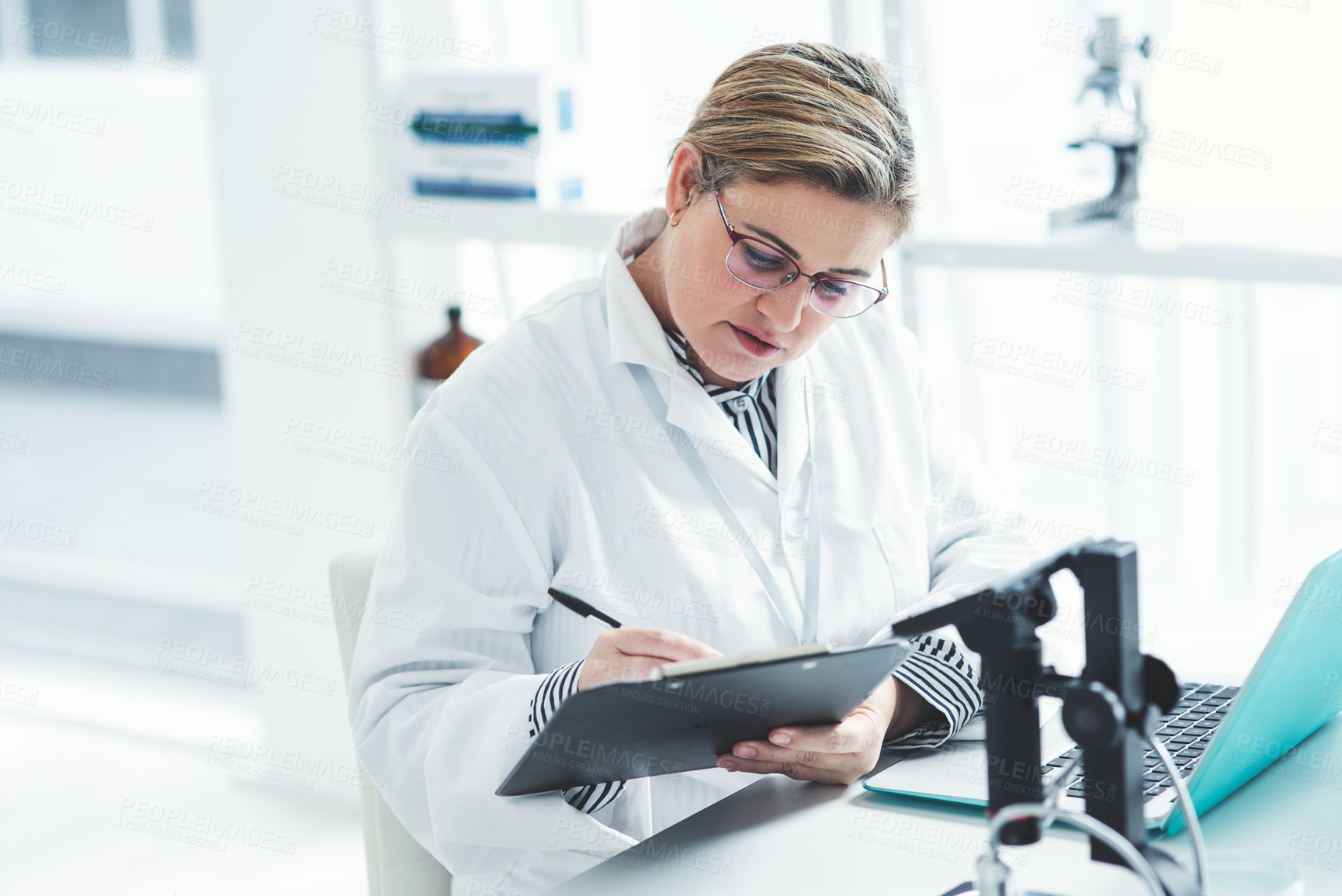 Buy stock photo Woman, scientist and document with laptop in lab for experiment results, study and information of mpox solution. Researcher, Denmark and healthcare checklist, vaccine process and observation notes