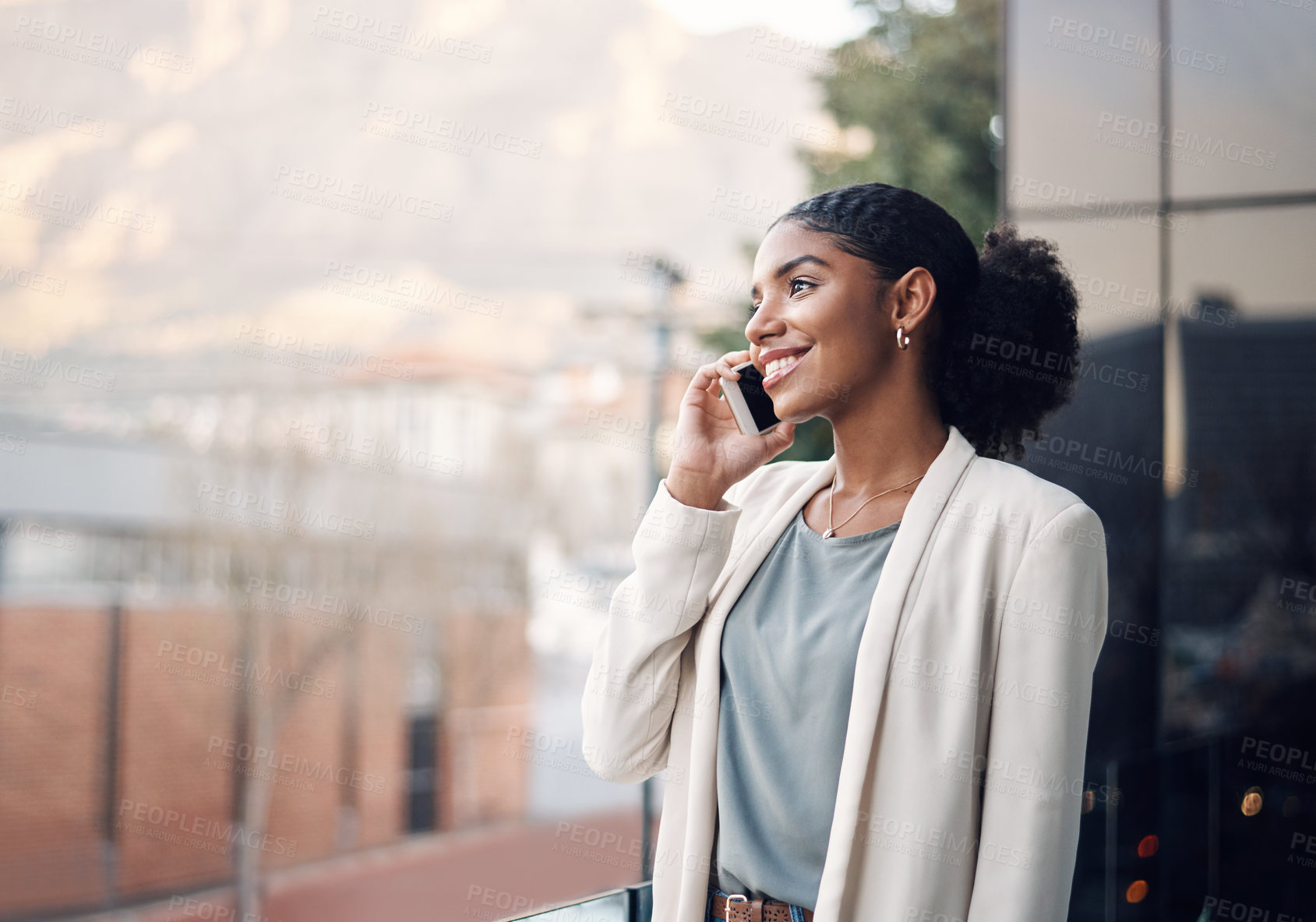 Buy stock photo Phone call, city and business black woman in conversation for planning, talking and networking. Communication, professional and worker on office balcony on smartphone in discussion, speaking and chat