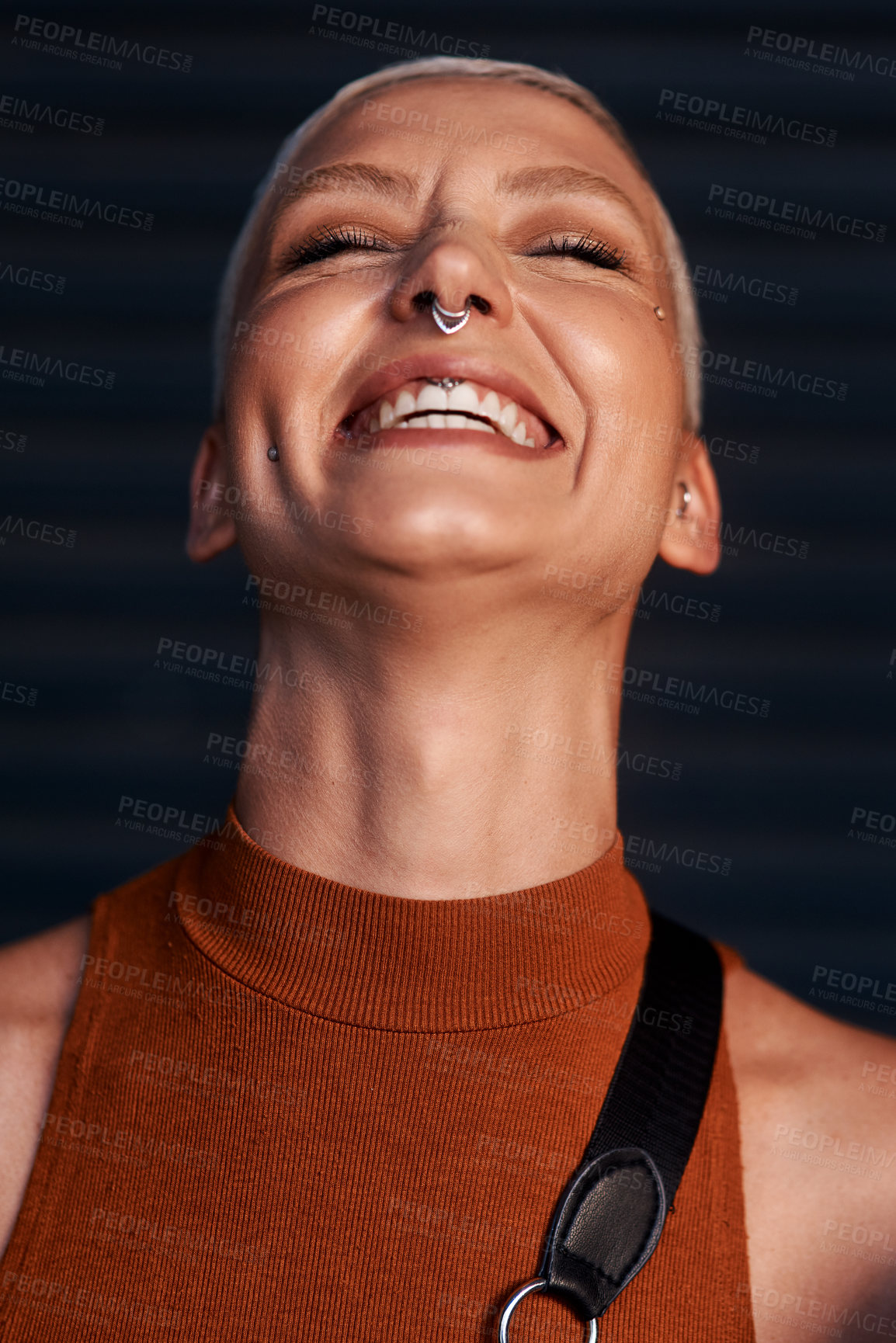 Buy stock photo Young woman, laugh and portrait with hipster and gen z fashion with a happy smile and piercing. Cool style, face and funny joke of a female person laughing with happiness, confidence and jewelry 