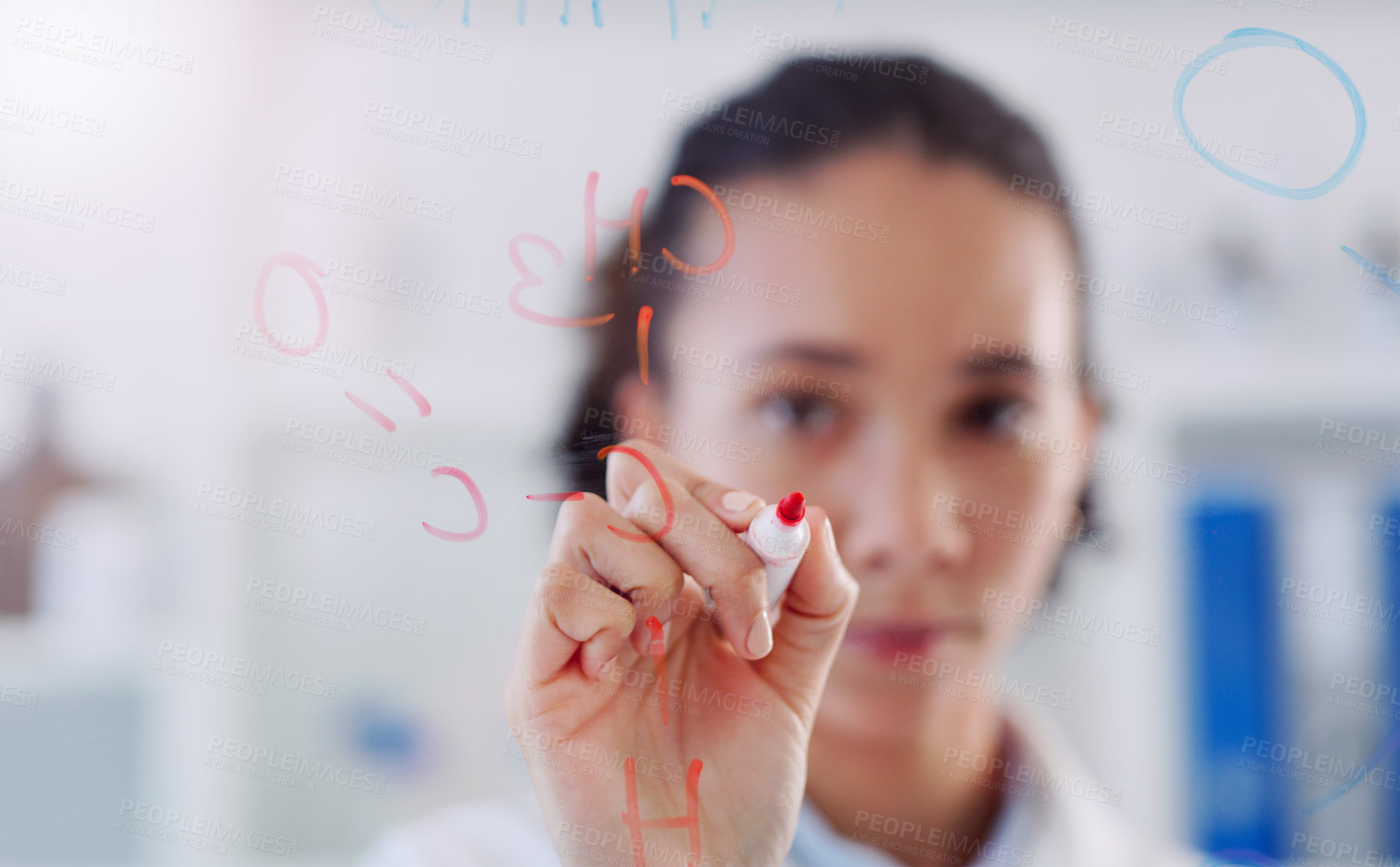 Buy stock photo Shot young scientist drawing molecular structures on a glass wall in a lab