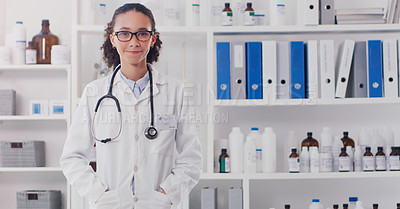 Buy stock photo Portrait of a young doctor standing in a lab