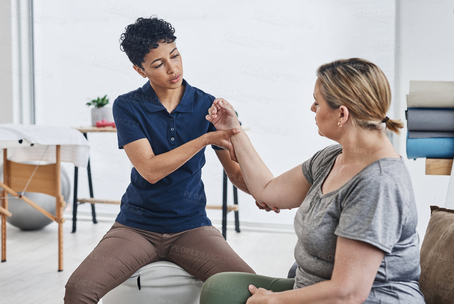 Buy stock photo Physiotherapy, woman and medical consultant with healthcare and rehabilitation advice. Physio, consultation and conversation for injury care and discuss exercise for joint help, healing and health