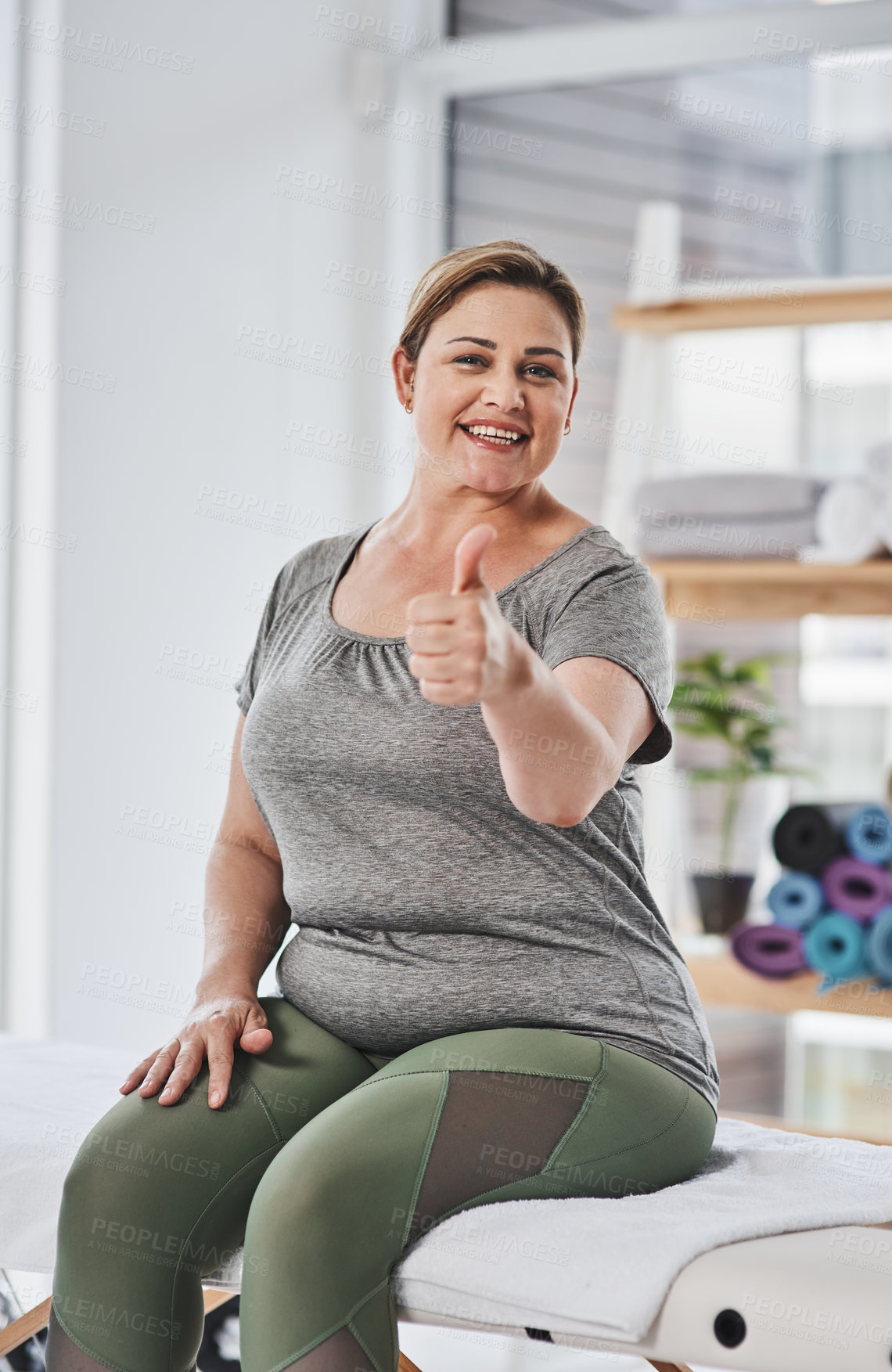 Buy stock photo Smile, physiotherapy and portrait of woman with thumbs up for support, approval and good review. Happy, patient and gesture with yes on bed for rehabilitation, feedback and success in session